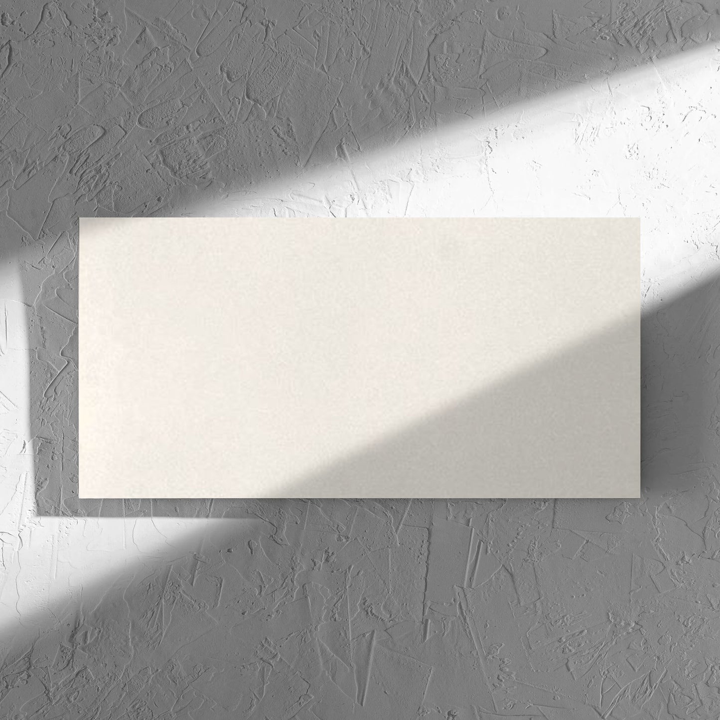 Yarra Bone Satin 300x600mm tile in soft natural window light, showing the tile surface
