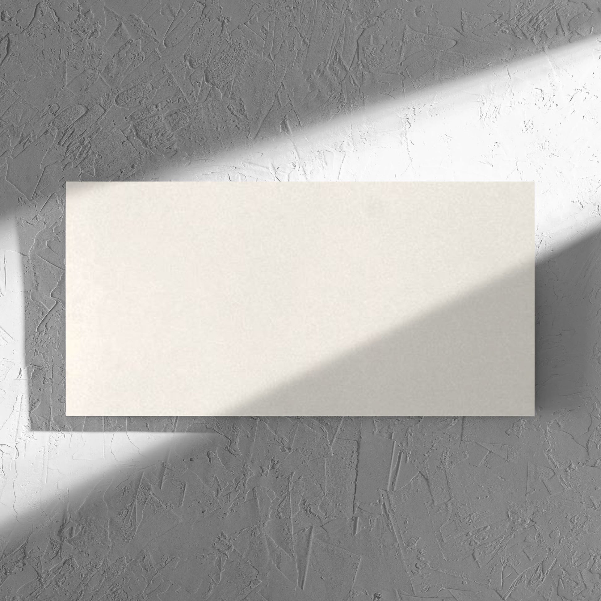 Yarra Bone Satin 300x600mm tile in soft natural window light, showing the tile surface