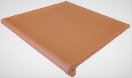Yulara Terracotta Step Nose 300x300mm tile shown as a single packshot with a smooth matte terracotta finish and rounded bullnose front edge.